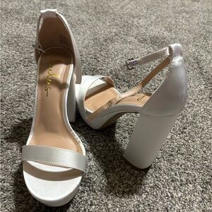 White platform heels